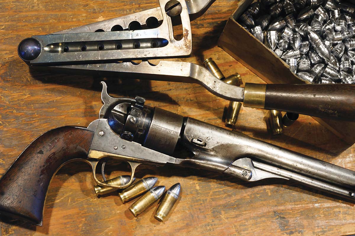 Colt 1860 Army Thuer conversion, with an original gang mould and a supply of its pointed bullets.